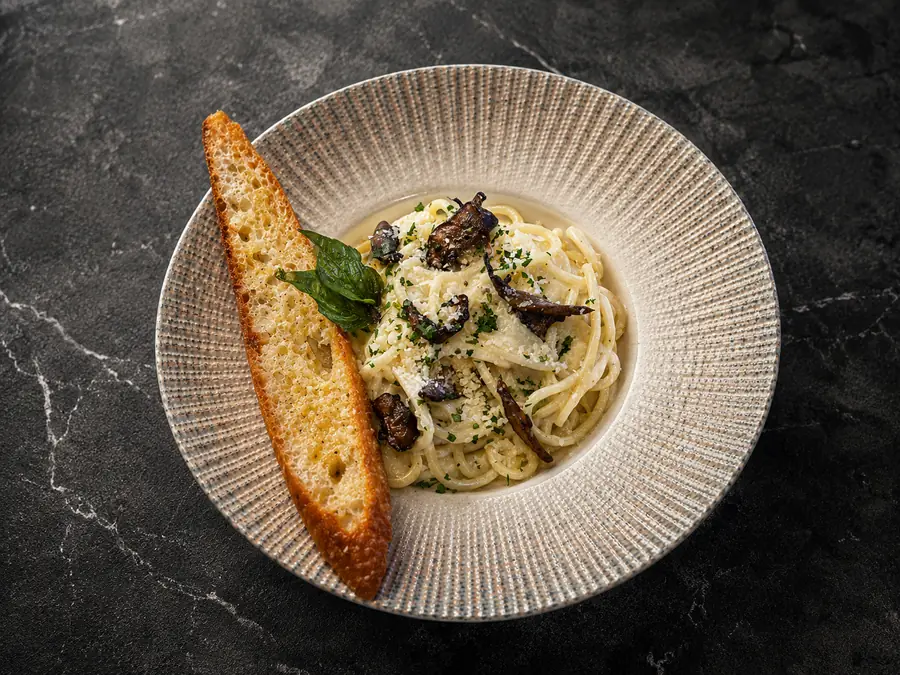 Truffle mushroom pasta served at MINA